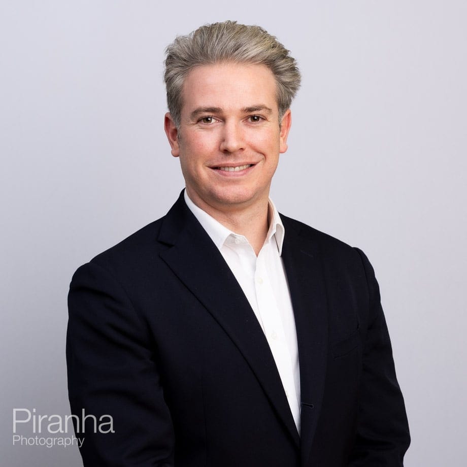 Plain Background Headshot Photography by Team Photographer Matt 3 Headshots against white backdrop.