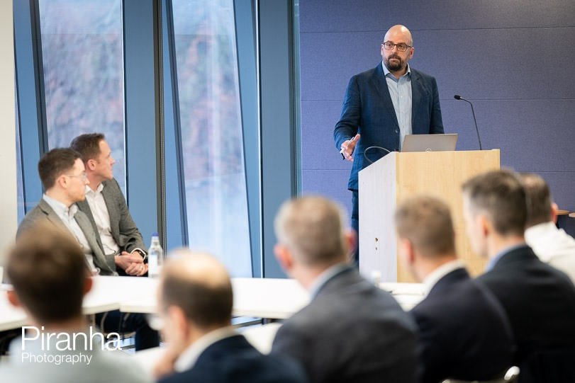 speaker photographed during rountable event in London