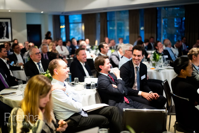 Audience reaction photographs at conference in London