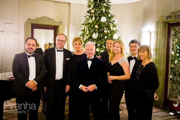 Christmas Party Photographer and Awards Ceremony Coverage 4 Group photograph with Christmas tree at Hotel in London