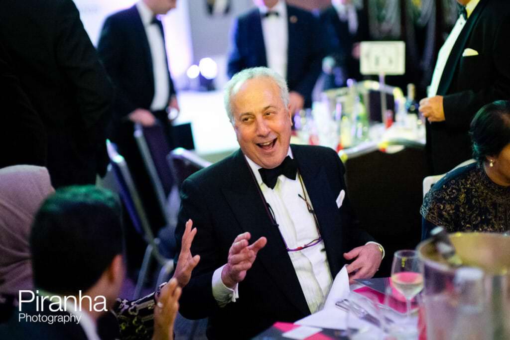 Guest at Christmas party dinner - photographed at Hilton Hotel in London