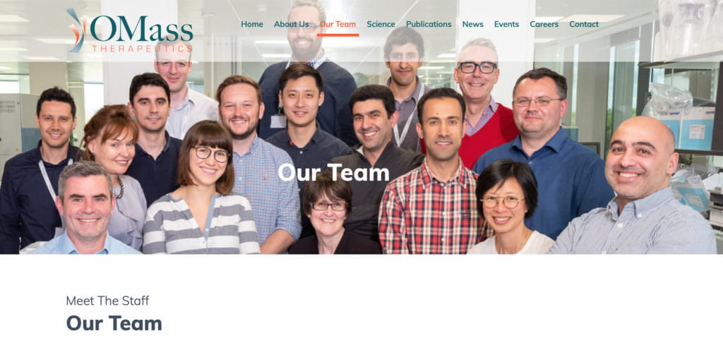 Oxford team photograph of all staff members together in laboratory - appearing at top of web page