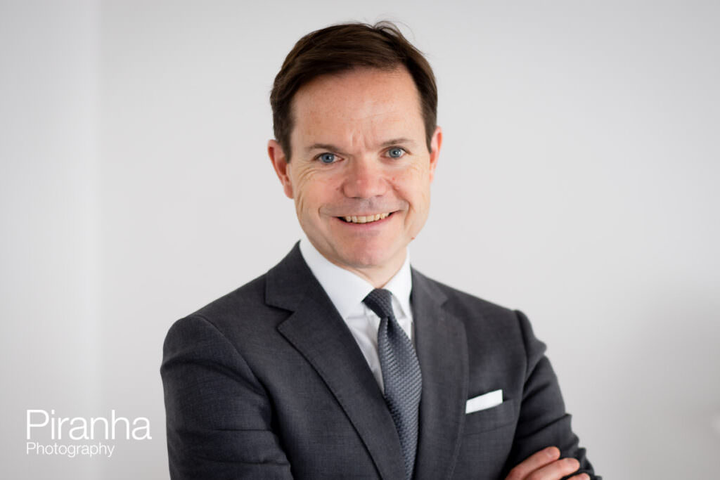 Headshot of director for private equity company website