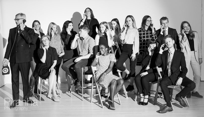 Studio photograph of team in black and white - fun, playful image
