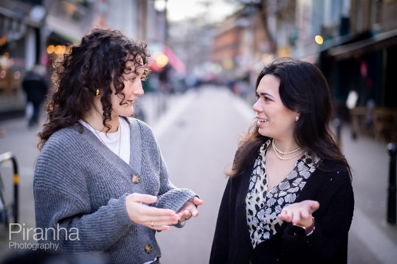 Outdoor photography for London company - staff members discussing.