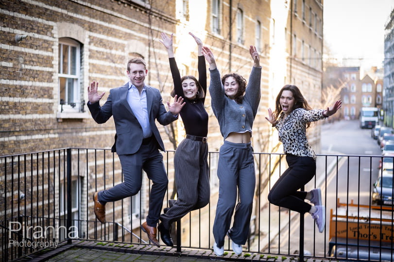Outdoor photography for London company - staff jumpin in the air - fun photograph