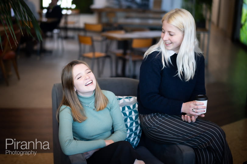 Office photography in London of staff members in conversation