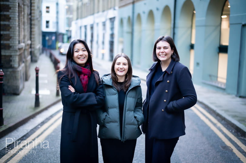 Office photography in London of staff members in conversation