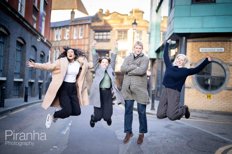 Outdoor photography for London company - jumping in street - fun photograph