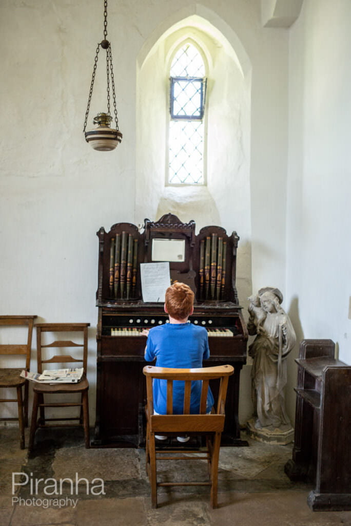 Playing the organ at a nearby empty church