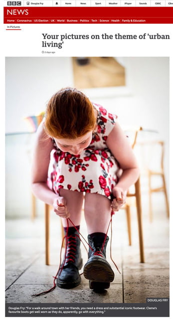 Photograph selected to appear on BBC News page in the theme of urban living - Cleme doing up her laces on her DM boots over lockdown.