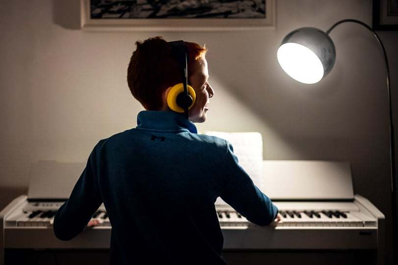 Edmund practicing the piano at home during lockdown.