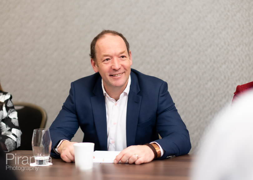 Board Photography for FTSE 100 Company - Taylor Wimpey's Annual Report 7 Photograph of FTSE 100 company Chief Executive in meeting in London