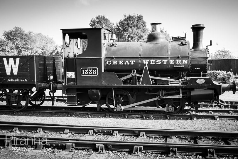 Steam railway train at Didcot Railway Centre photographed in the autumn and shown here in black and white
