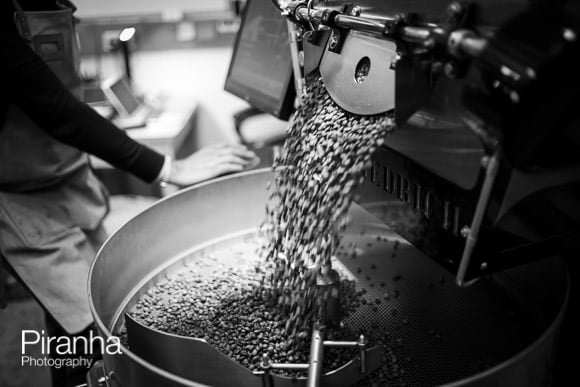 business website photography of coffee machine grinding the beans