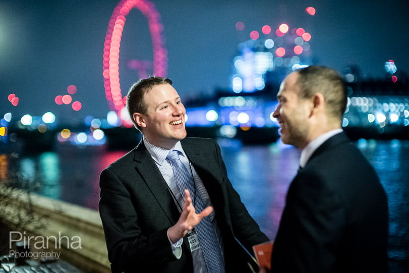 Guests outside during London event next to the Thames at the Houses of Parliament