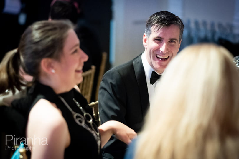 Guests at dinner - evening event photographer in London