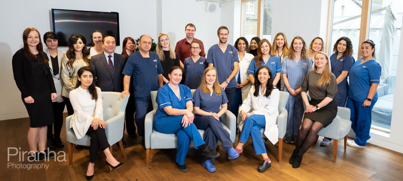 Large group photograph of medical team in London