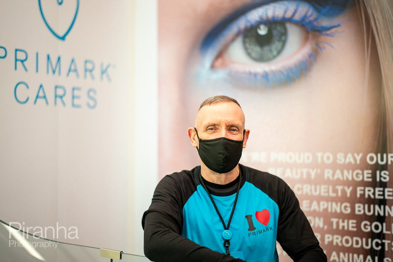 Staff member in Birmingham Primark - store photography