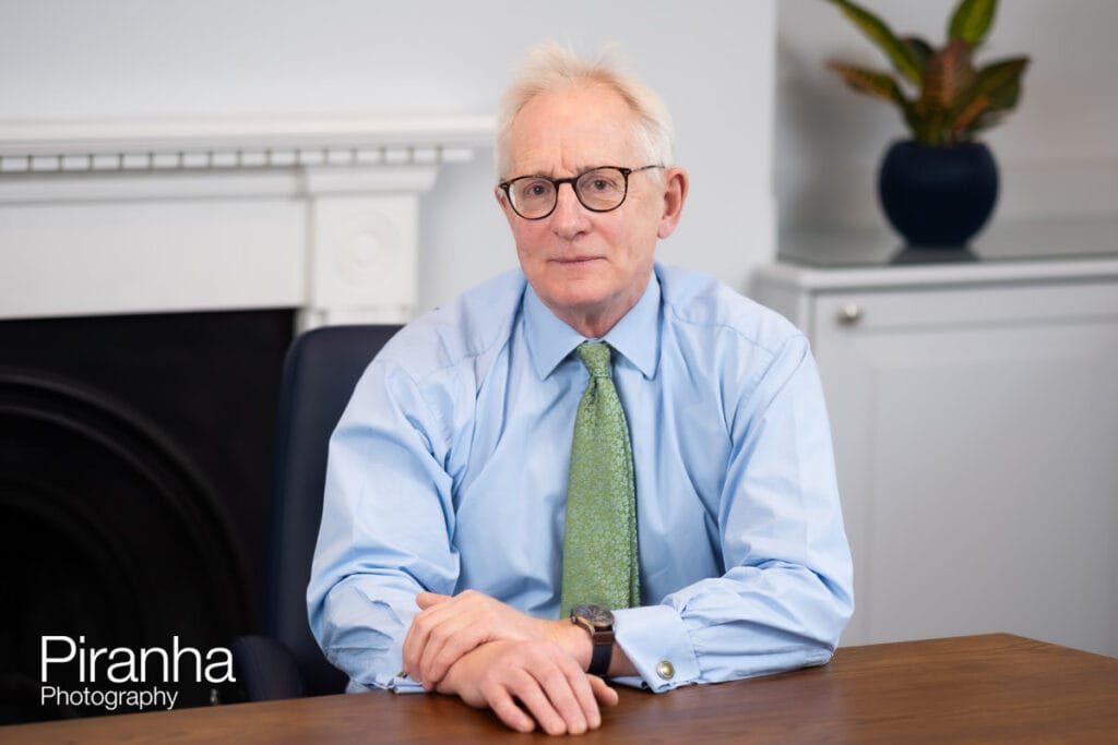 Office photograph of barrister in London location for Our People page of website