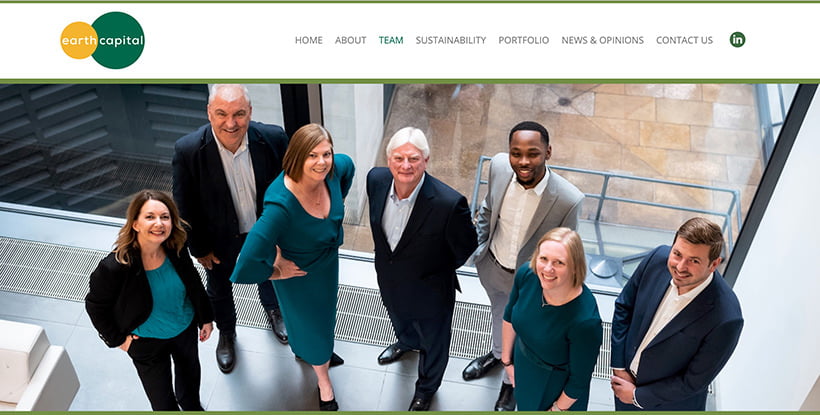 Website showing group photograph of investors