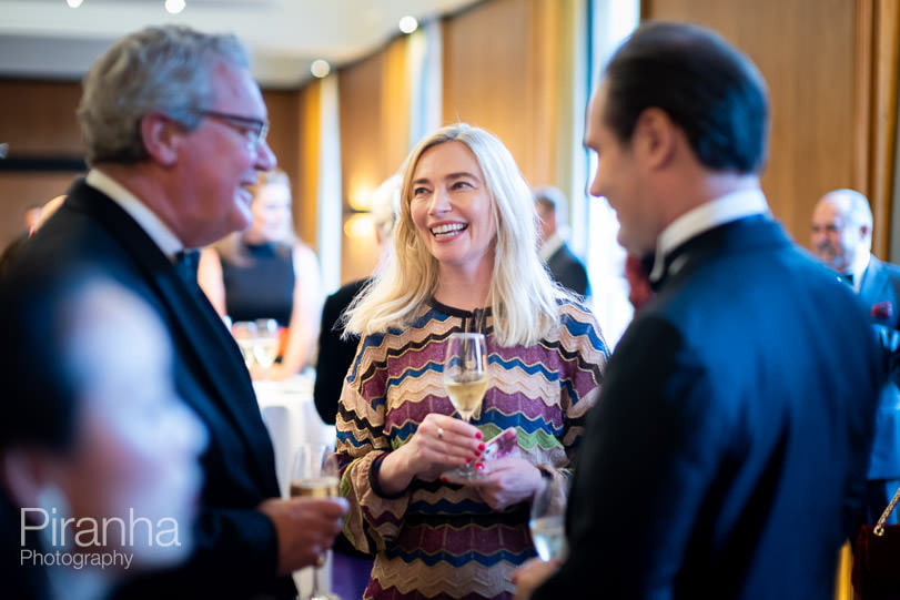 Guests enjoying drinks in London venue