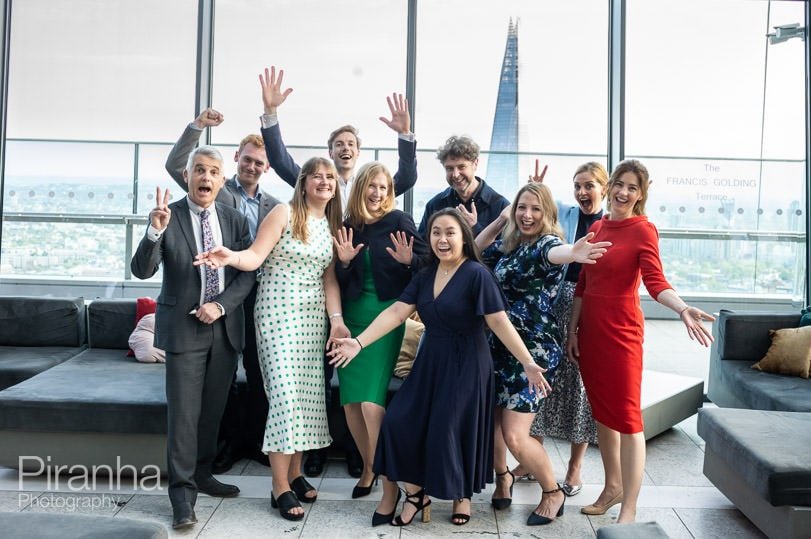Team photograph at company anniversary party in Walkie Talkie Building - Sky Garden