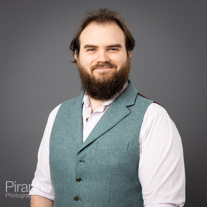 Team Photographs for Website by Team Photographer Matt 9 Corporate portrait photograph taken with grey background.