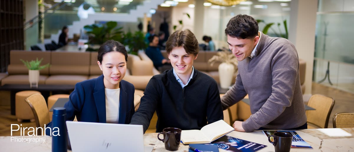 Office photograph of team at work for new website careers section.