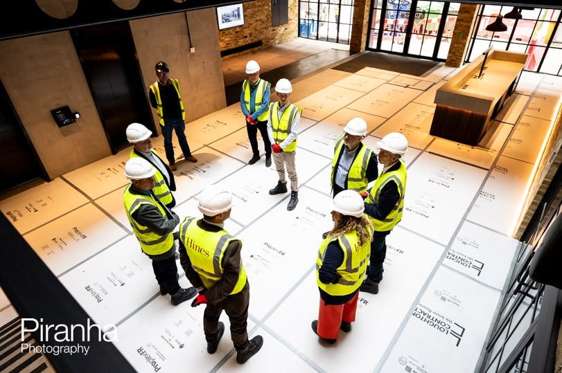 Team photographed visiting new properties under construction in London
