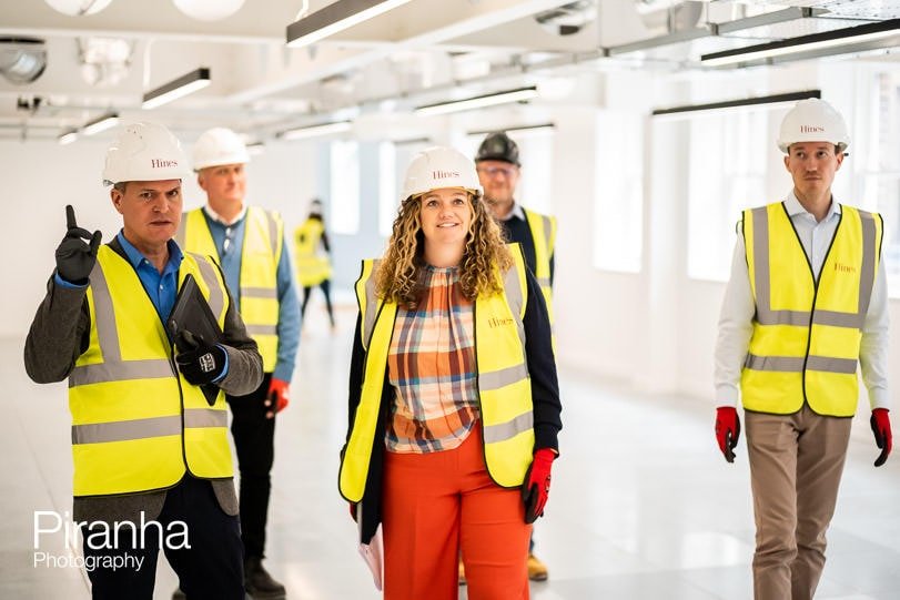 Real estate firm - team photographed visiting new properties under construction in London