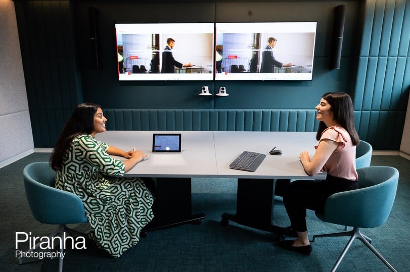 Working office photograph taken in London offices of employees during a meeting