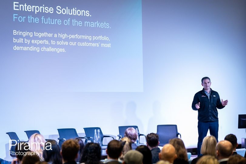 Presenter photographed during corporate event in London