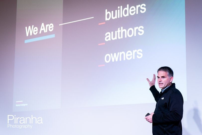 Presenter photographed during corporate event in London