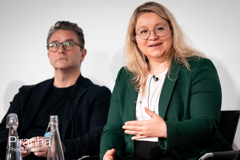 Presenter photographed during corporate event in London