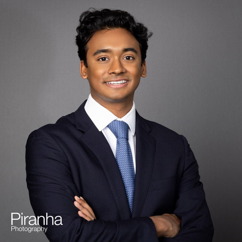 Headshot photographer in London - portrait against grey backdrop