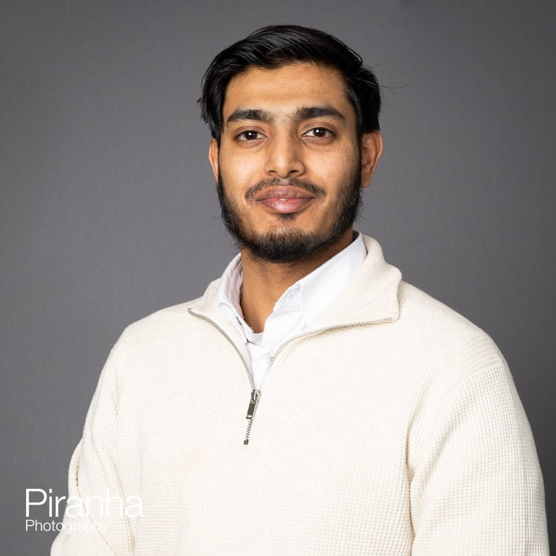 Headshot photographer in London - portrait against grey