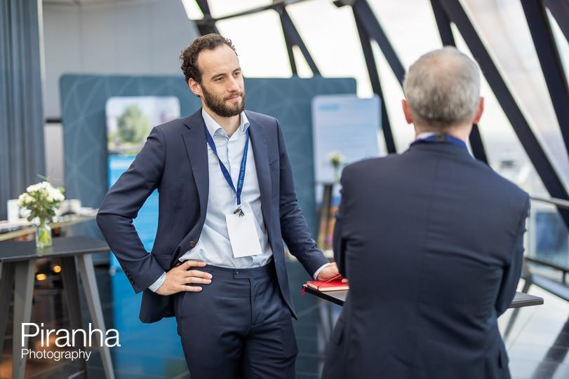 Guest photographed at corporate breakfast event in London at the Gherkin