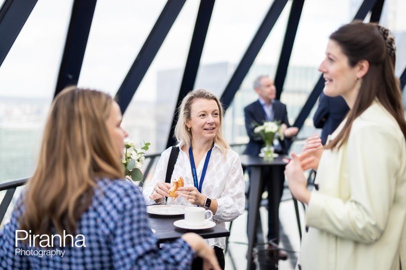 Guest photographed at corporate breakfast event in London at the Gherkin