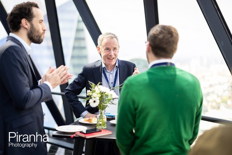 Guest photographed at corporate breakfast event in London at the Gherkin