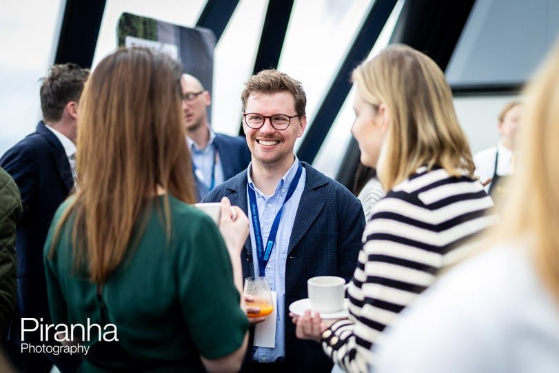 Guest photographed at corporate breakfast event in London at the Gherkin