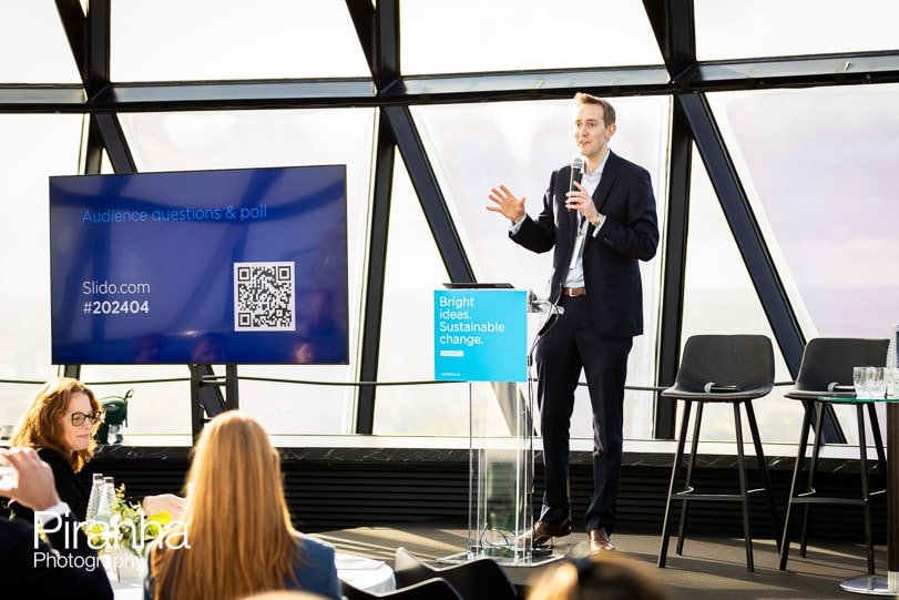 Speaker photographed at corporate breakfast event in London at the Gherkin