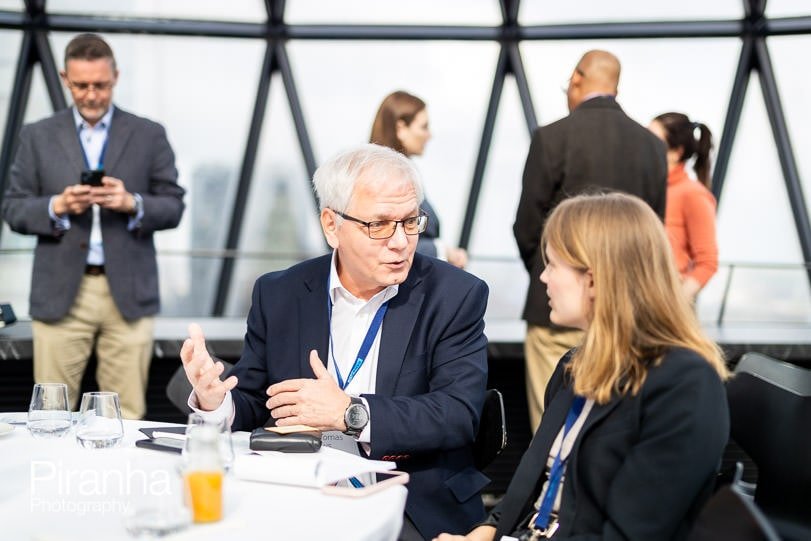 Guests photographed at corporate breakfast event in London at the Gherkin