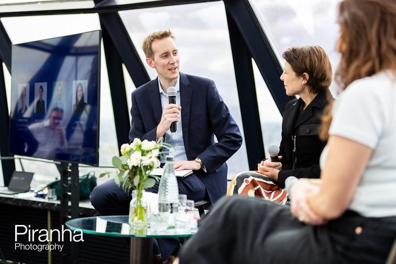 Speaker photographed at corporate breakfast event in London at the Gherkin