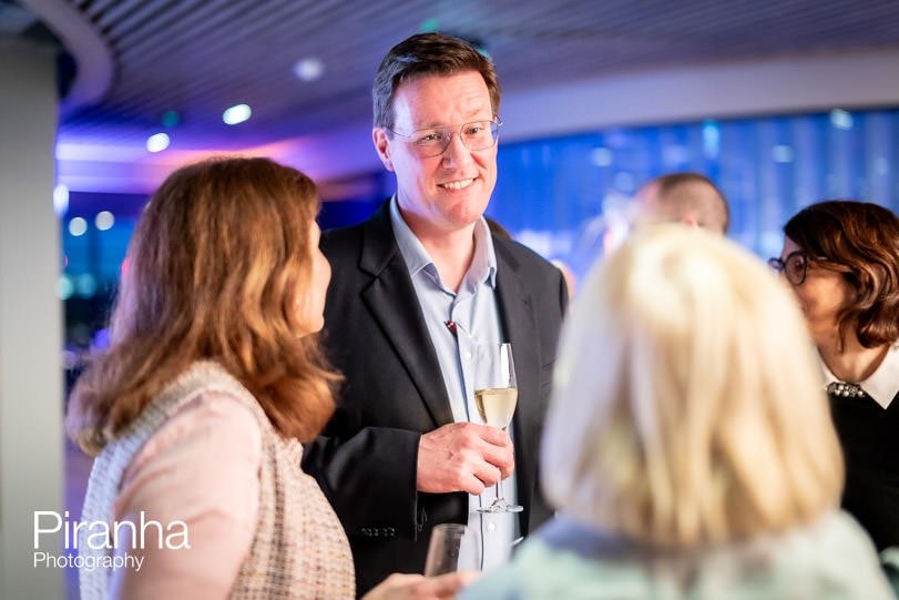 Guests photographed during corporate party in London