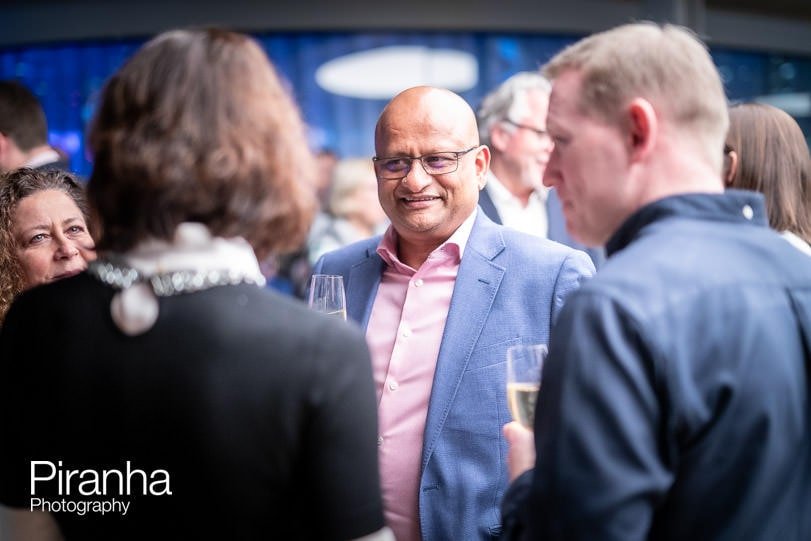 Guests photographed during corporate party in London