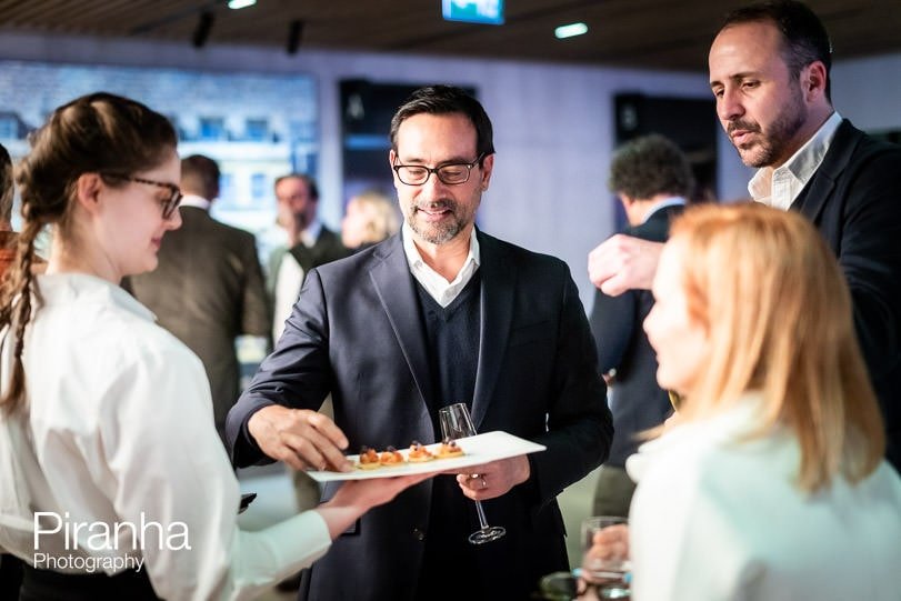 Guests photographed during corporate party in London