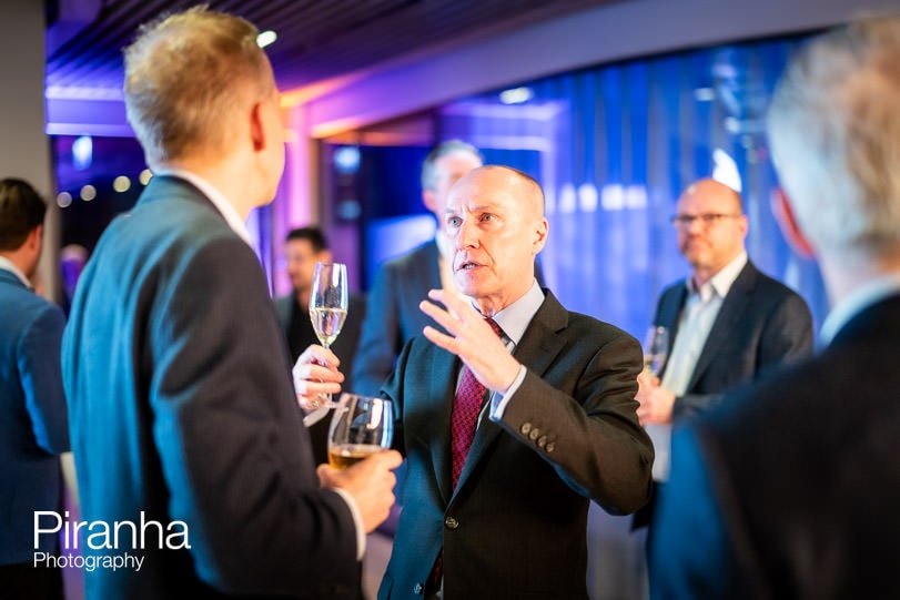 Guests photographed during corporate party in London