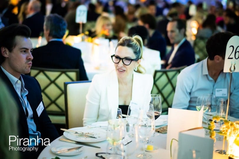 Photography of Gala dinner attendees at the Peninsula in London.