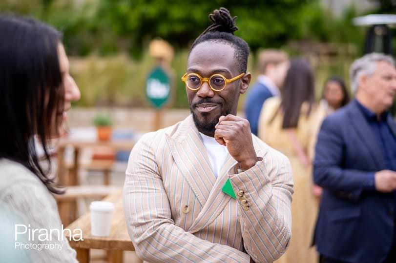 Event photography of global conference of entrepreneurs at Soho Farmouse in Oxfordshire.